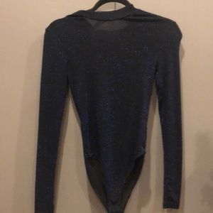 Sheer black turtle neck bodysuit